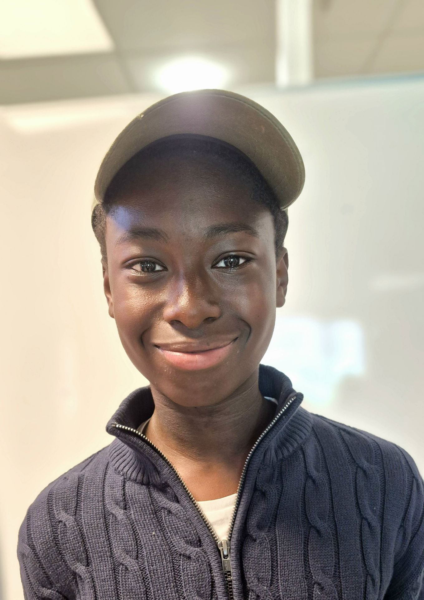 Foto: Isaac Agyei Agyemang en person med hatt